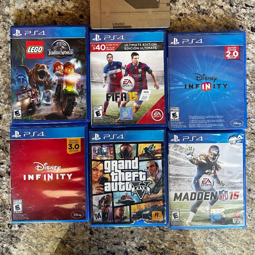 PS4 Video Games Lego Jurassic World, EASports, Disney Infinity, Grand Theft Auto